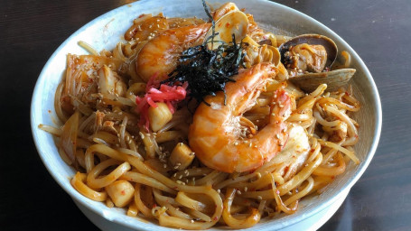 65. Kimchi Seafood Fried Udon Pào Cài Hǎi Xiān Chǎo Wū Dōng