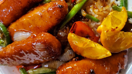 Orange Plant Based Vegan Crispy Chicken With Rice And Veggie