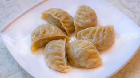 B8. Pork Vegetable Potstickers Cài Ròu Guō Tiē