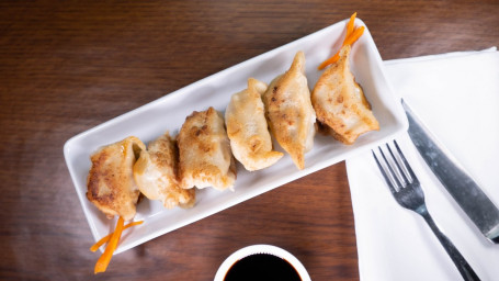 A9. Pot Stickers (6)