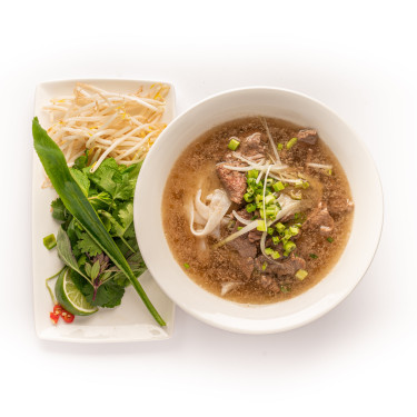 Garlic steak phở noodle soup