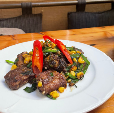 Wok-Sautéed Pork Ribs With Fresh Chive And Sweet Corn In Mint Chilli Sauce