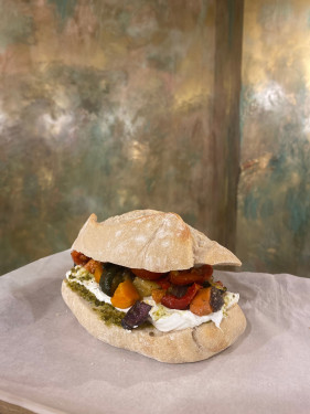 Goats Curd, Roasted Vegetables Green Pesto Baguette.