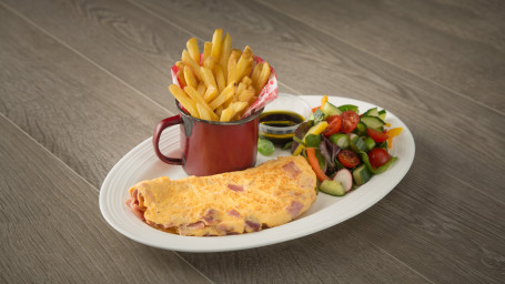 Omelette With Ham Served With Chips And Salad
