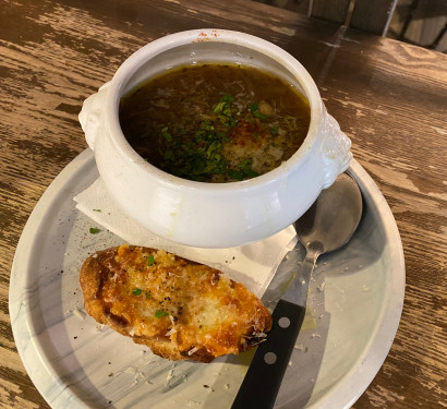 French Onion Soup. Melting Cheese