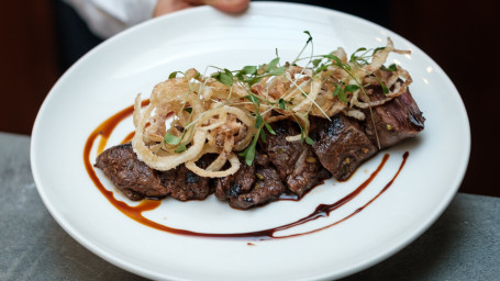 Charolais Beef Fillet, Marinated In Tamarind And Grilled, Fried Onions, Ghoa Cress And Homemade French Fries