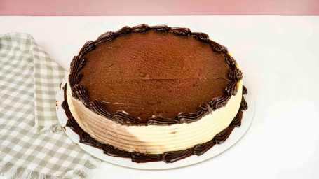 (8-12 Servings) Round All Ice Cream Cake Topped With Fudge.