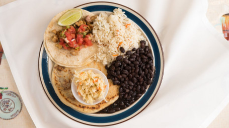 #6. One Pupusa Of Your Choice, One Taco, Rice, Your Choice Of Black, Pinto Or Refried Beans