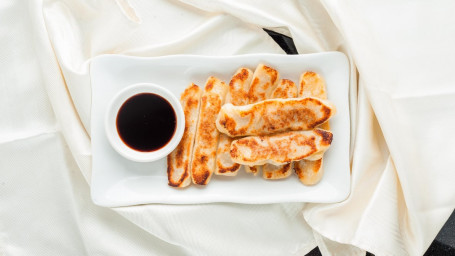 D8. Zhū Ròu Guō Tiē Pork Pot Stickers