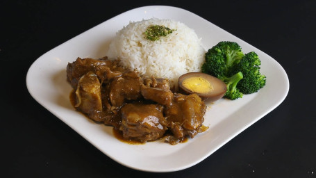 En10. Hong Kong Style Curry Chicken On Steamed Rice Gǎng Shì Kā Lí Jī Fàn