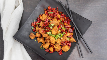 Deep Fried Diced Chicken In Dried Red Peppers