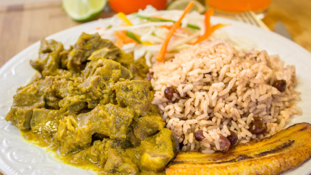 8. Ackee Saltfish Curry Goat